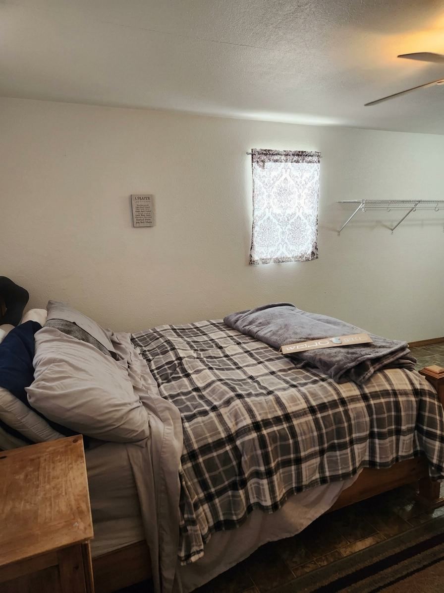 Bed made up — bedding is provided